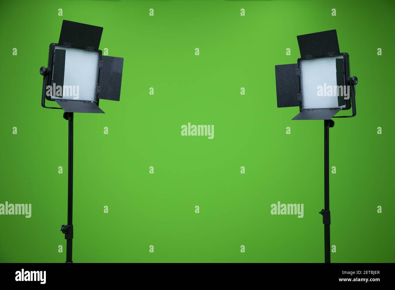 Green screen television studio with two fill lights. Lights are turn