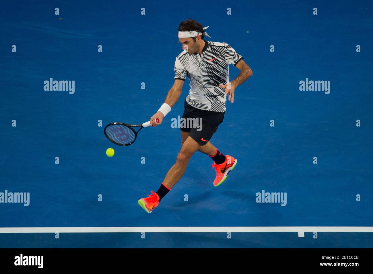 170116) -- MELBOURNE, Jan. 16, 2017 (Xinhua) -- Roger Federer of  Switzerland hits the ball during the men's singles first-round match  against Jurgen Melzer of Austria at the Australian Open Tennis Championships