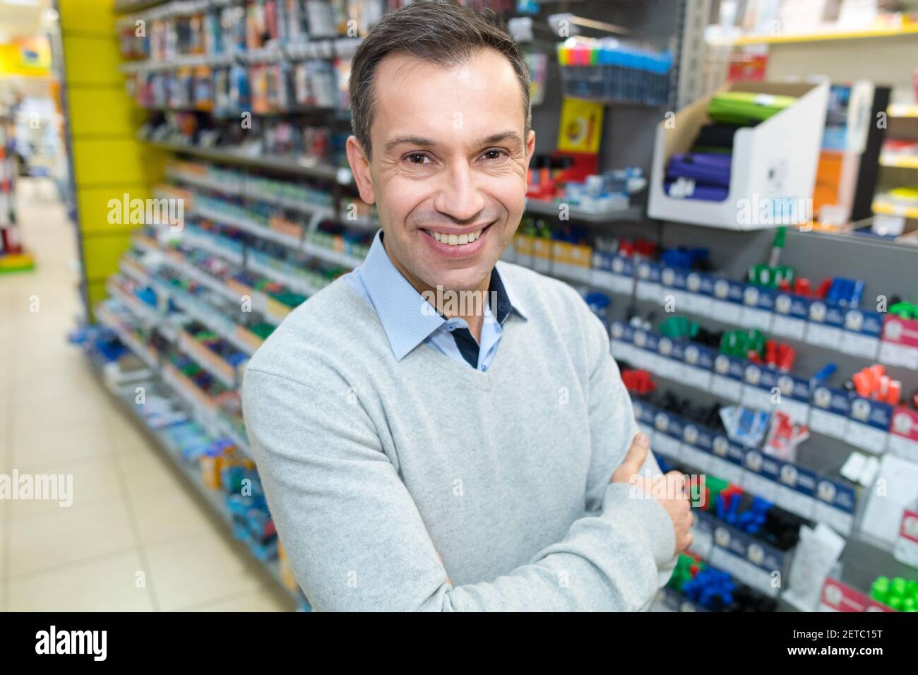 man posing confidently in the store Stock Photo