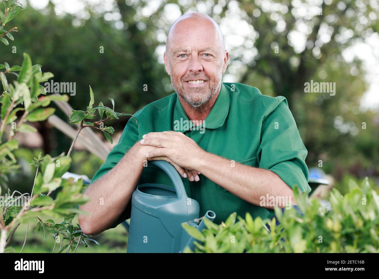 Old man gardening and enjoying retirement hi-res stock photography and ...