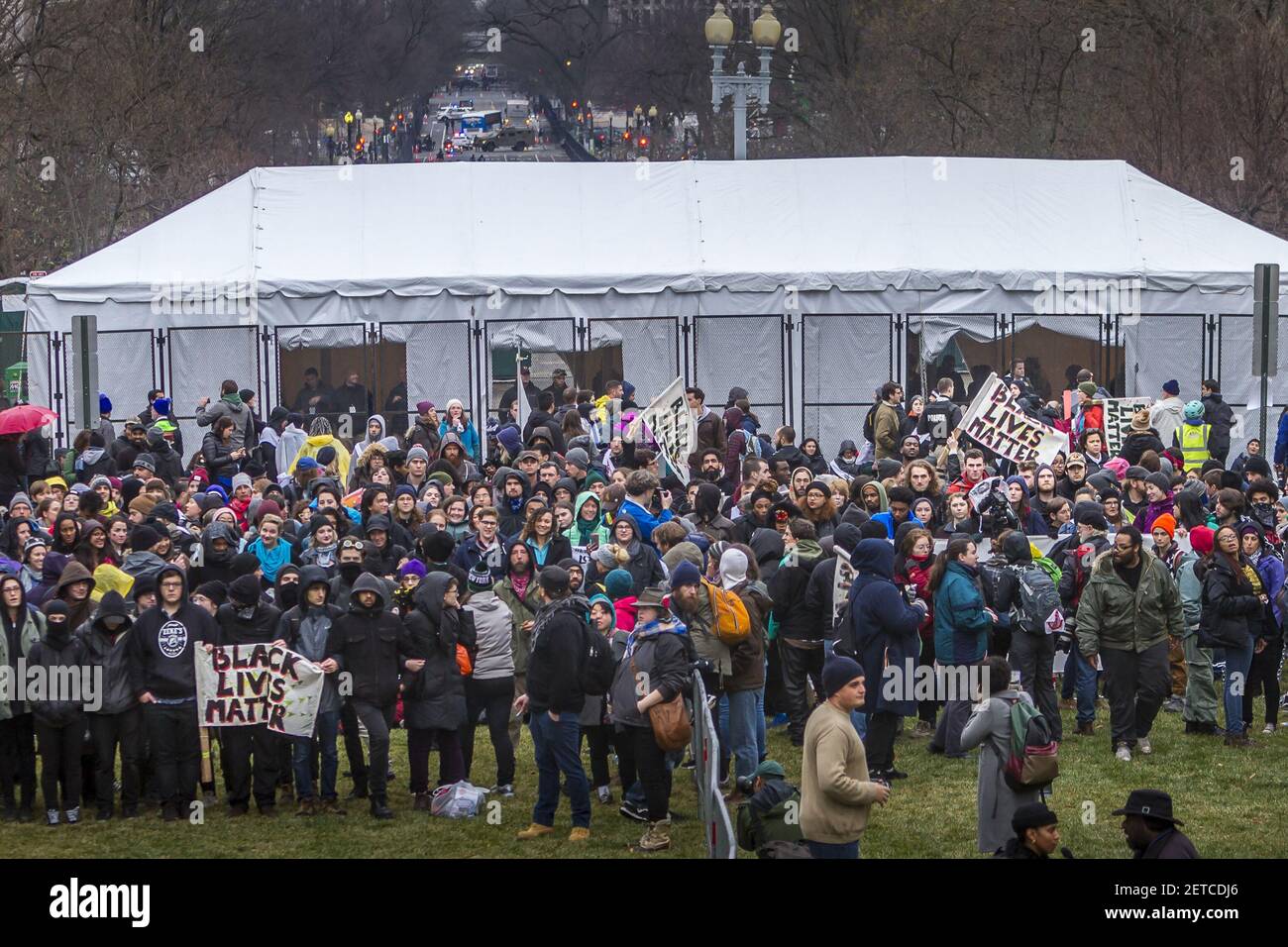 Dozens of people protest before the inauguration of President-elect Donald J. Trump in Washington, D.C., on January 20 2017. (Photo by Michael Nigro) *** Please Use Credit from Credit Field *** Stock Photo