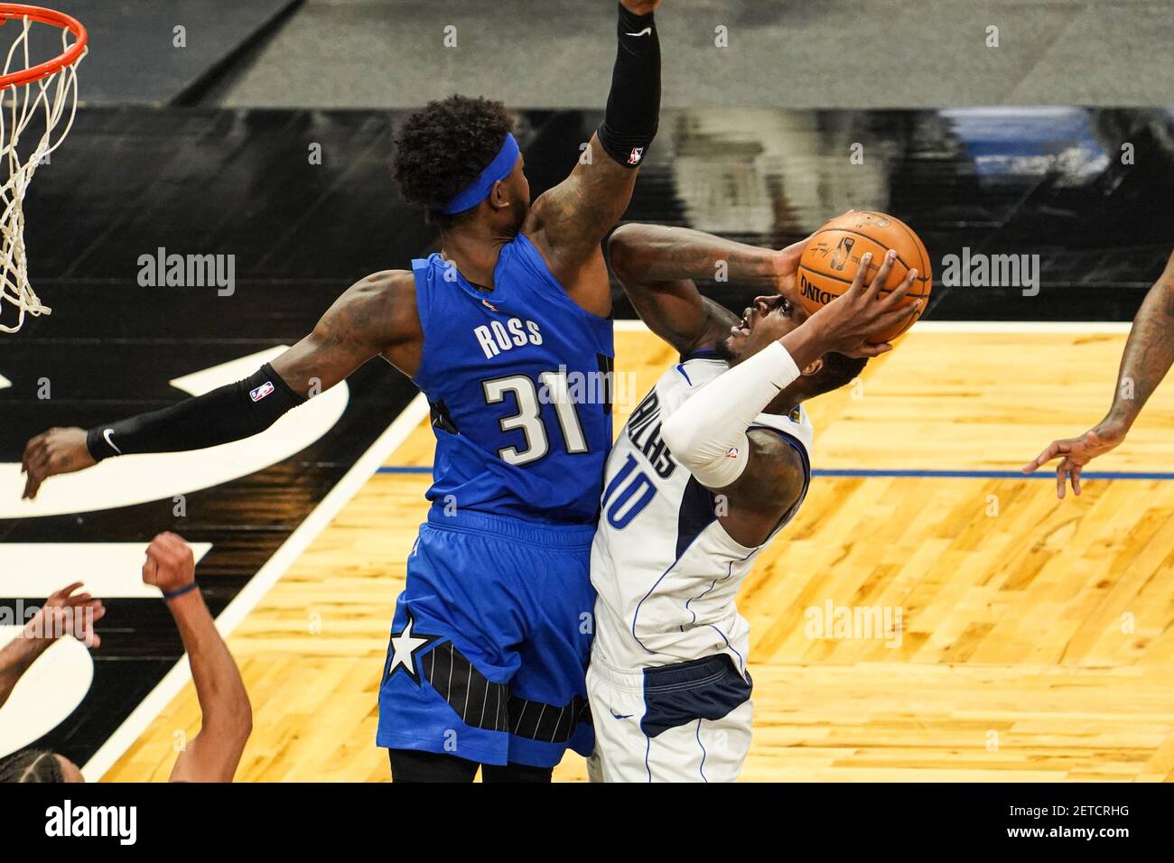 Orlando, Florida, USA, March 1, 2021, Dallas Mavericks player Dorian Finney-Smith #10 attempt to make a basket at the Amway Center (Photo Credit: Marty Jean-Louis/Alamy Live News Stock Photo