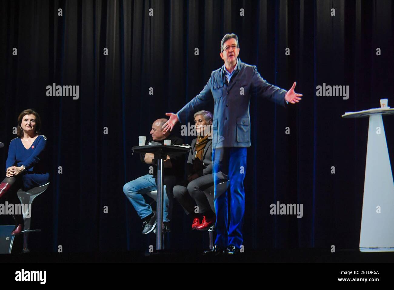 Jean-Luc Melenchon meeting with his hologram. Jean-Luc Melenchon, le  candidat de la "France insoumise" organise deux meetings en meme temps a  Lyon (Rhone) et a Aubervilliers (Seine-Saint-Denis) grace a son hologramme  (Photo