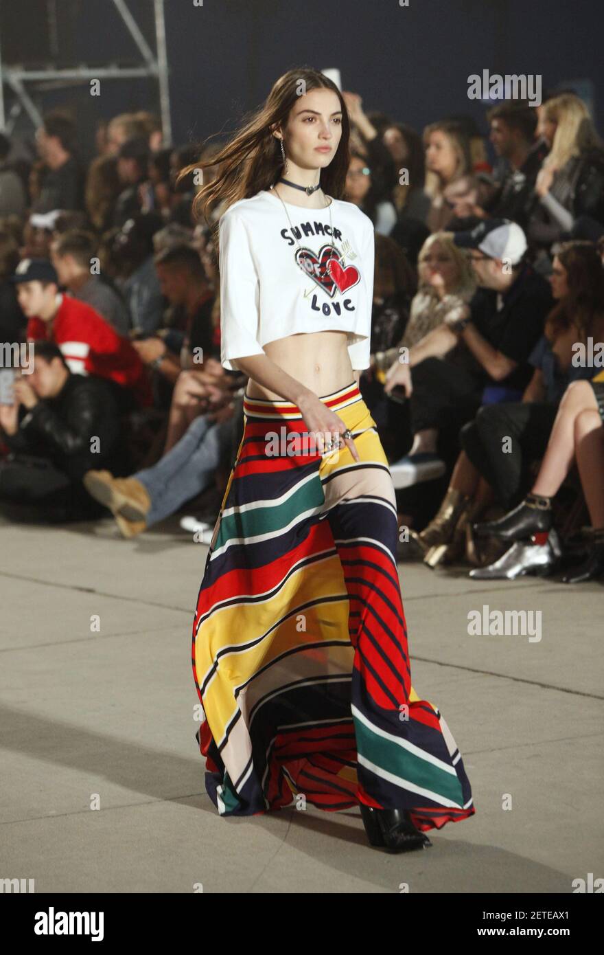 Model Camille Hurel walks the runway at the TommyLand Tommy Hilfiger Spring  2017 Fashion Show on