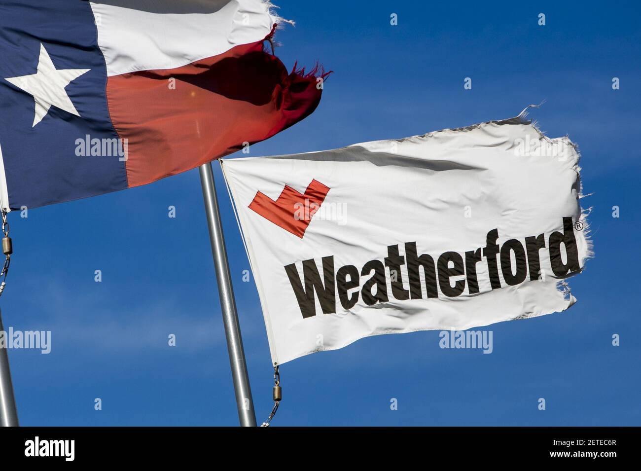 A logo sign outside of a facility occupied by Weatherford in Elmendorf
