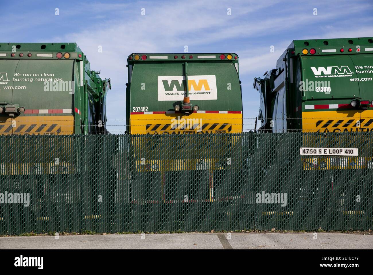 Logo signs on Waste Management, Inc., trucks in San Antonio, Texas on ...