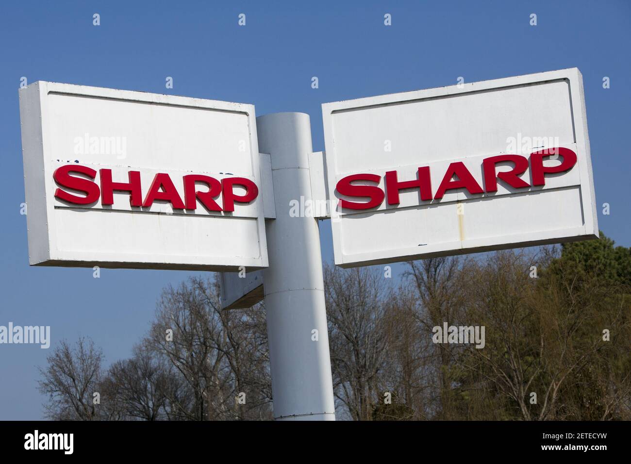 Sharp Unit Sign A logo sign outside of a facility occupied by the Sharp Corporation in ...