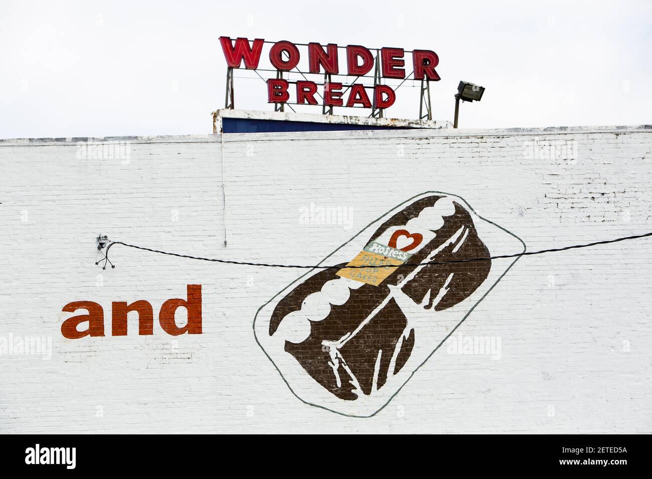 A logo sign outside of the abandoned Wonder Bread and Hostess Cake