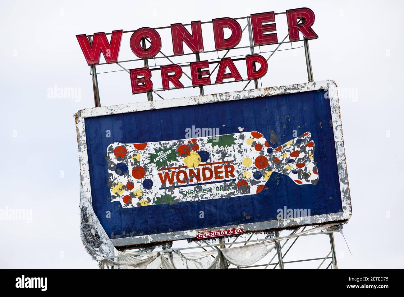 A logo sign outside of the abandoned Wonder Bread and Hostess Cake