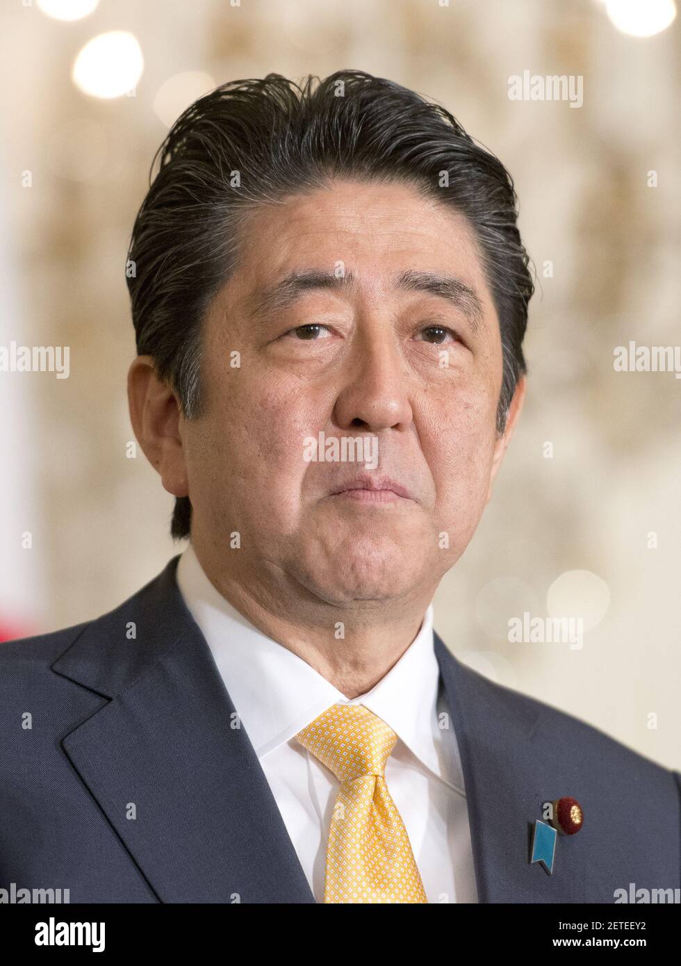 Prime Minister Shinzo Abe of Japan makes remarks during a joint press conference with United States President Donald J. Trump in the East Room of the White House in Washington, DC on Friday, February 10, 2017. The two leaders are scheduled to have lunch at the White House and dinner with their wives at Mar-a-Lago in Florida. (Photo by Ron Sachs/CNP) *** Please Use Credit from Credit Field ***  Stock Photo