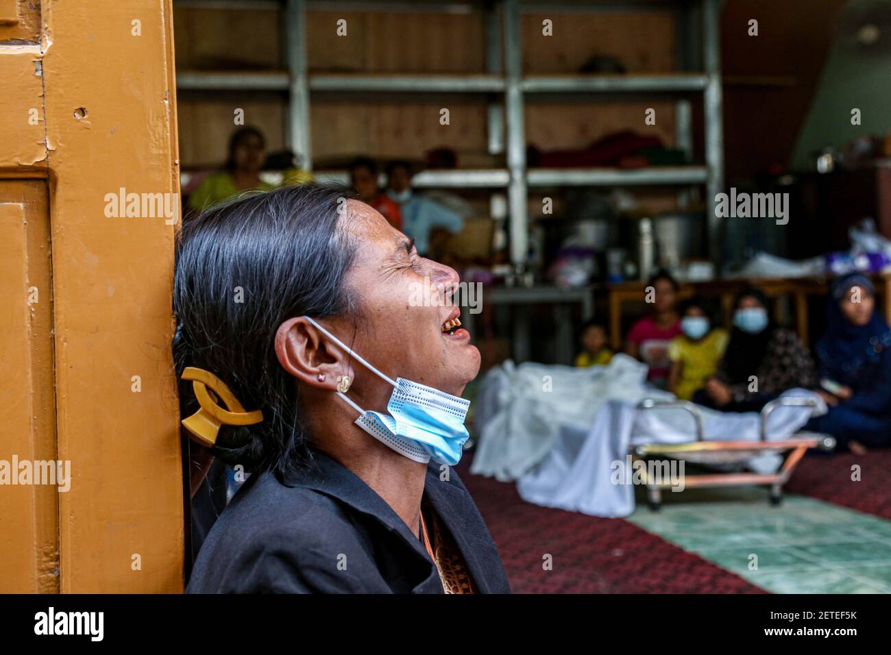 A woman is seen crying at the funeral of Daw Dasi who was shot dead by the  Myanmar Security Forces on February 28.Myanmar Security Forces fire rubber  bullets, real bullets, tear gas