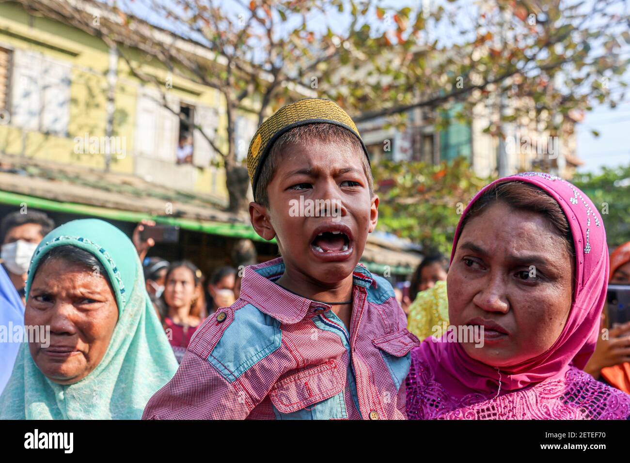 A child seen crying at the funeral of Daw Dasi who was shot dead by the  Myanmar Security Forces on February 28.Myanmar Security Forces fire rubber  bullets, real bullets, tear gas and
