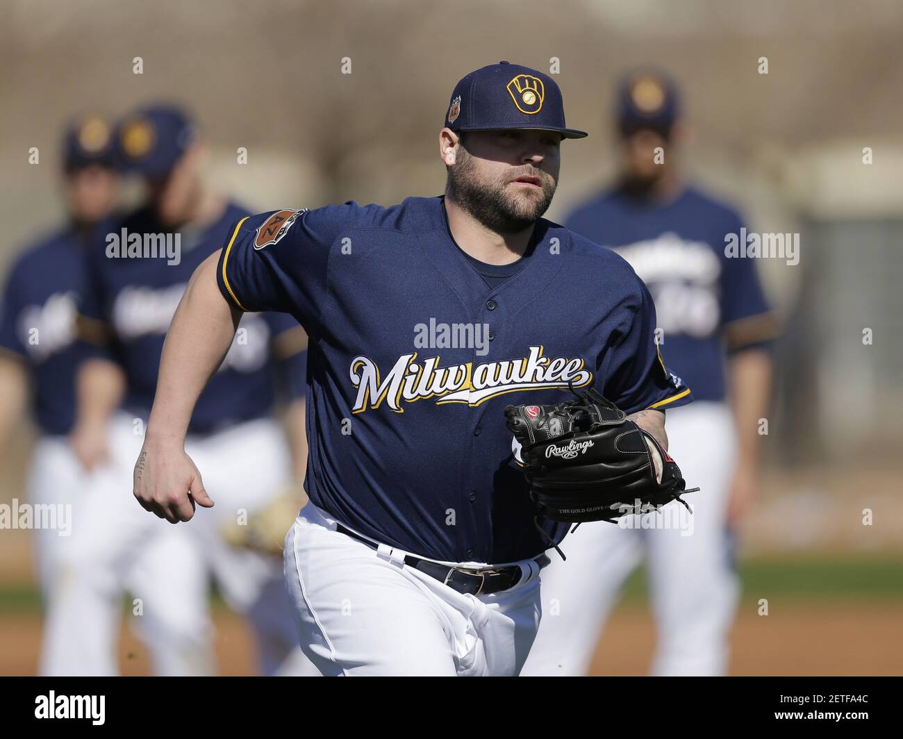 Feb 16, 2017; Maryvale, AZ, USA; Milwaukee Brewers relief pitcher Joba Chamberlain (62) covers first base during spring training camp drills at Maryvale Baseball Park. Mandatory Credit: Rick Scuteri-USA TODAY Sports *** Please Use Credit from Credit Field *** Stock Photo
