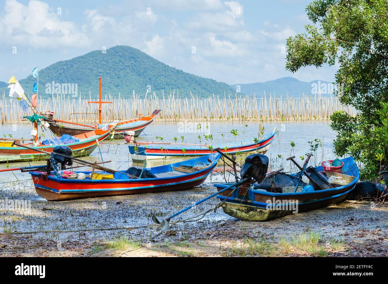 Wood Fishing Boat is Moored on the Beach Stock Photo - Alamy