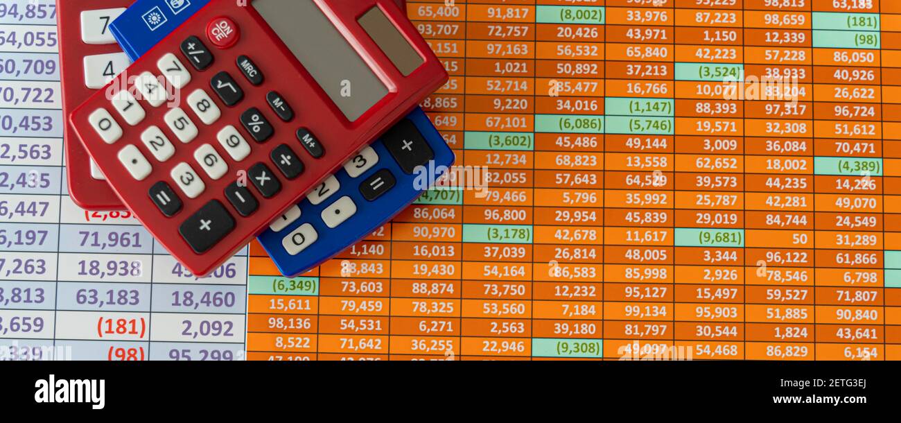 Collection of Calculators on a spreadsheet background - Financial Concept  Stock Photo - Alamy