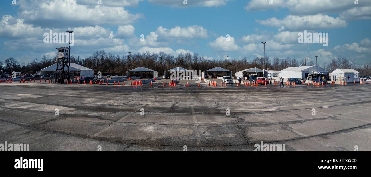 Aerial view of COVID 19 virus vaccination drive through supersite Maryland providing mass immunization, cones separating cars ,mass vaccination site Stock Photo