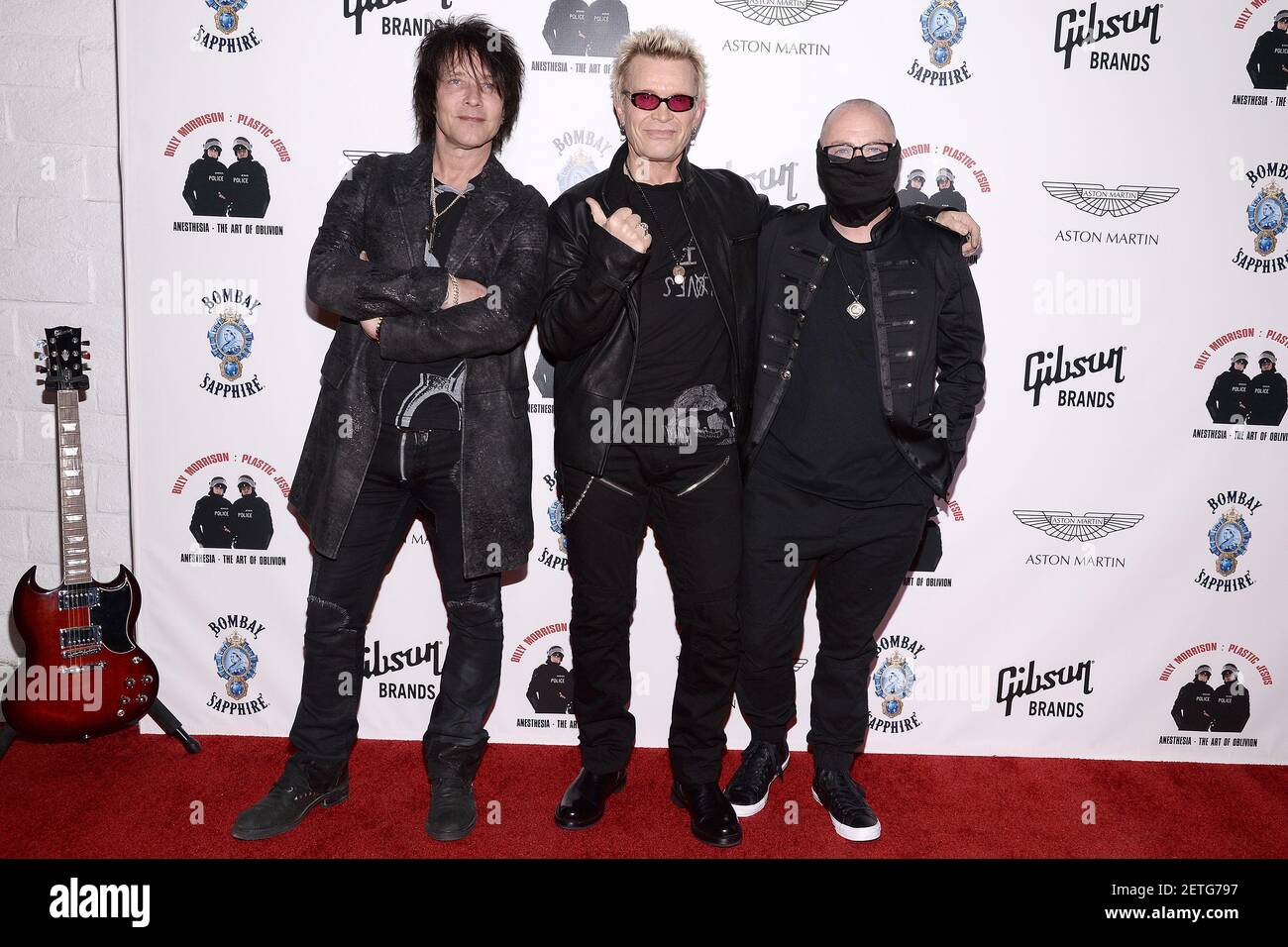 (LR) Billy Morrison, Billy Idol and street artist Plastic Jesus attend