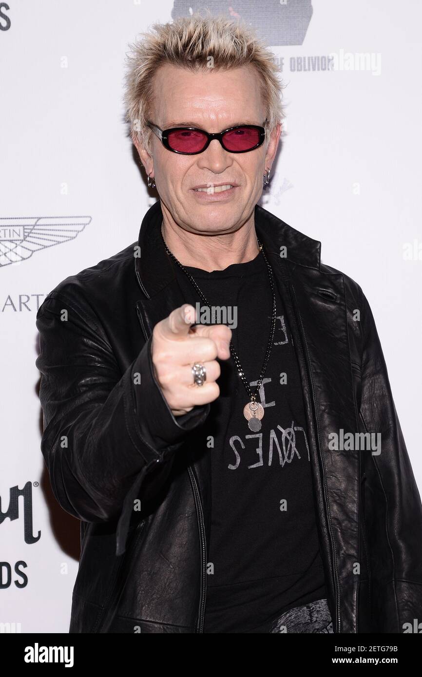 Musician Billy Idol attends artist Plastic Jesus gallery opening at the