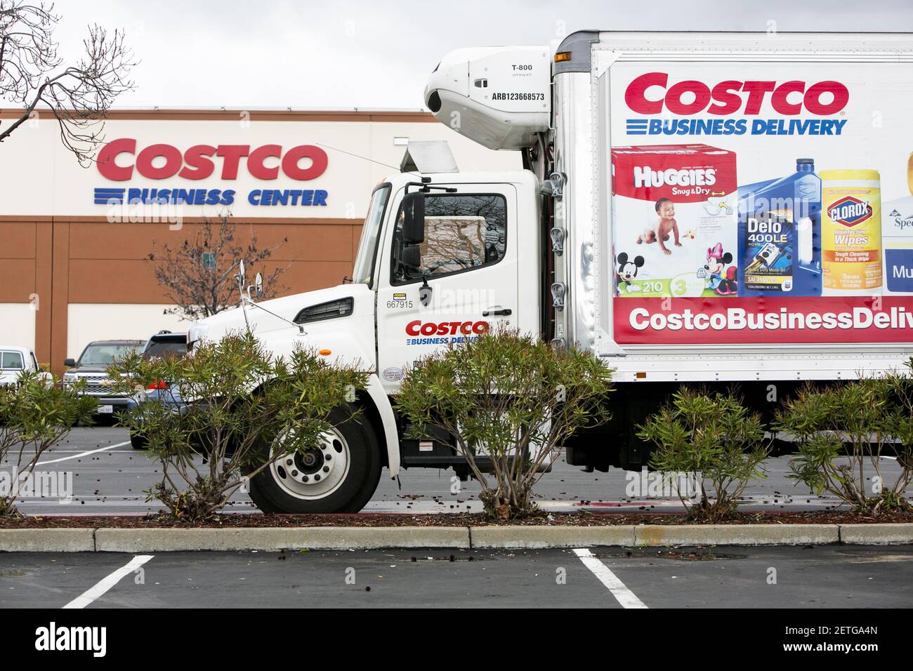 A logo sign outside of a Costco Business Center retail store in Hayward
