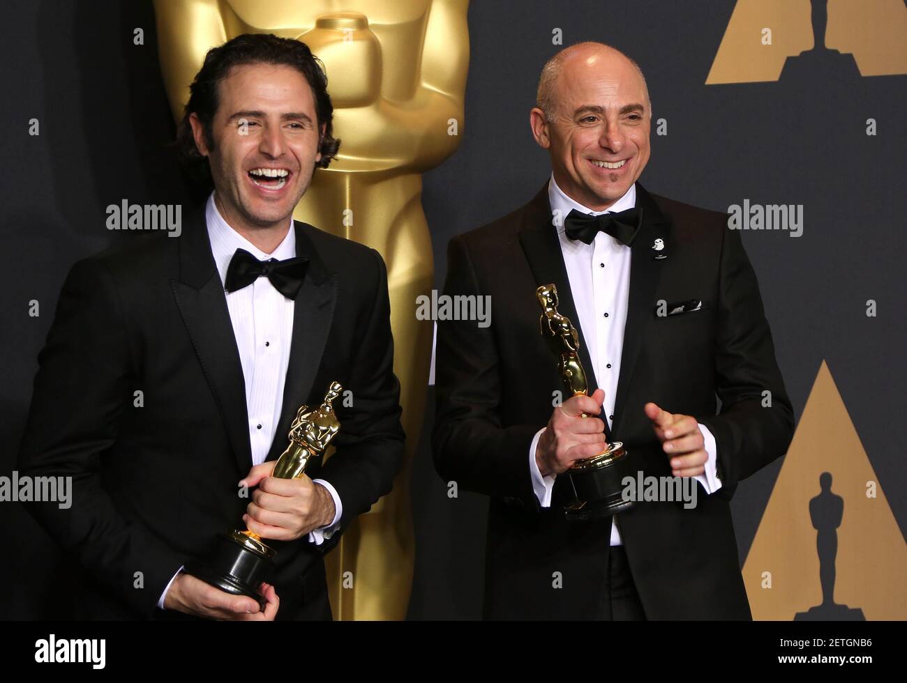 Diirector Alan Barillaro and producer Marc Sondheimer, winners of Best  Animated Short Film for 'Piper' pose in the Press Room during the 89th  Academy Awards ceremony, presented by the Academy of Motion