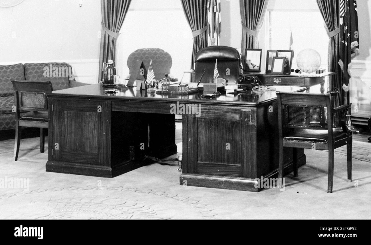Photograph of President Truman's desk and other furnishings in the Oval Office of the White