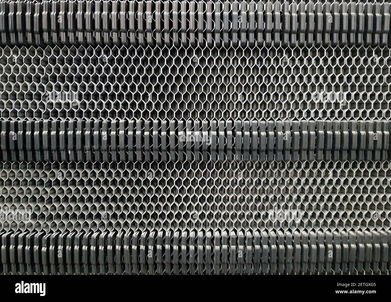 Background of the plate heat exchanger radiator grille Stock Photo