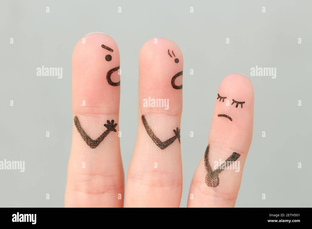 Fingers art of family during quarrel. Concept of parents scold naughty child. Stock Photo
