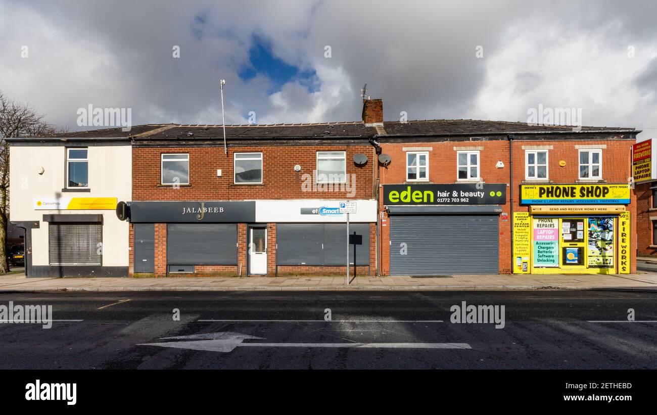 Row of shops closed during the Covid-19 lockdown January 2021. Stock Photo