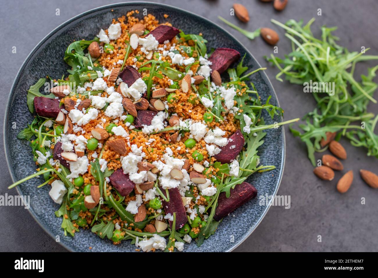 healthy home made couscous salad with sweet potato, beetroot and feta cheese Stock Photo