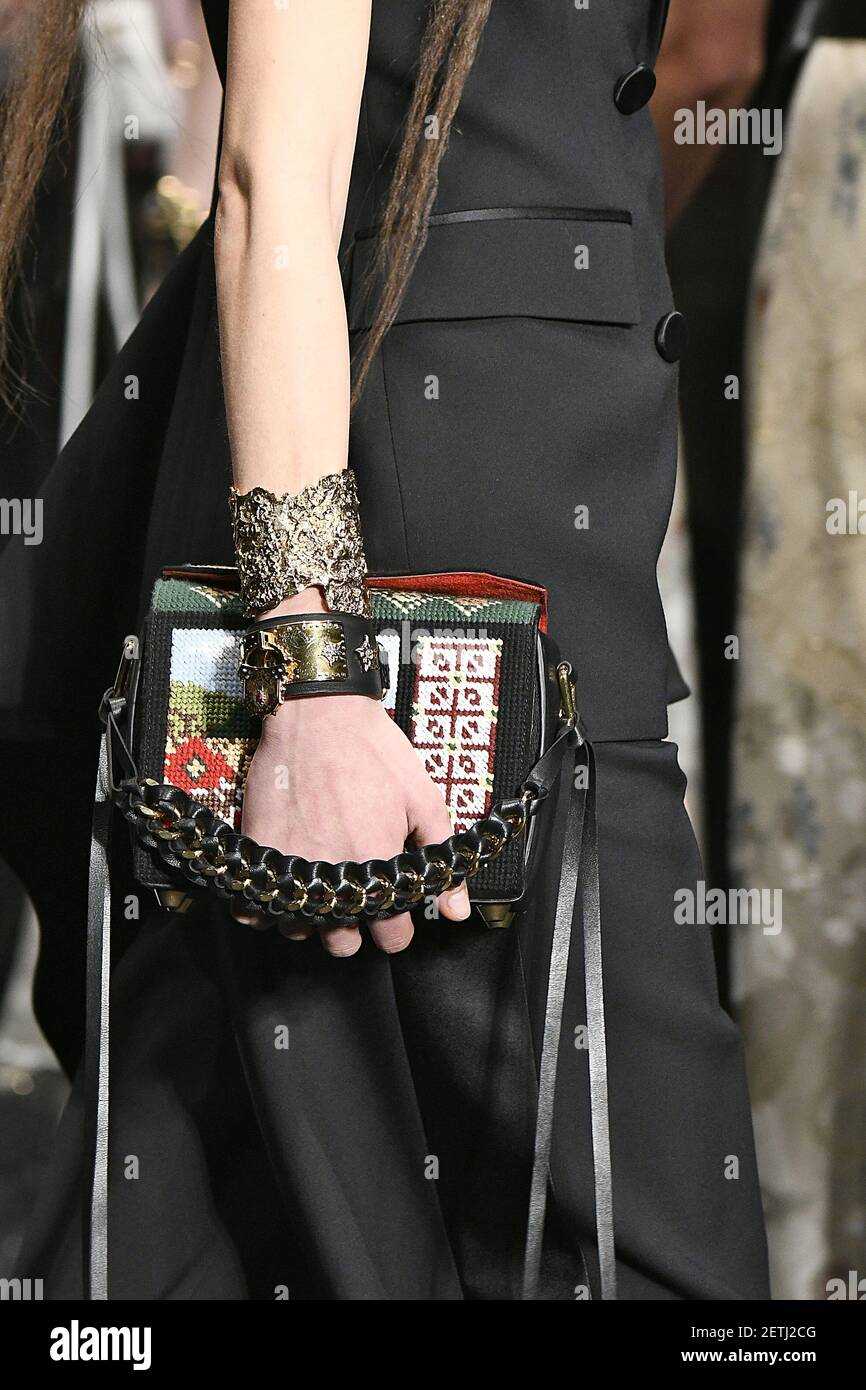 Details and accessories the runway during the Alexander McQueen Show at F/W 17