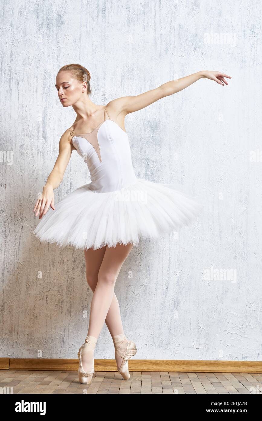 Legs ballerina pointe shoes white tutu performance Stock Photo Alamy