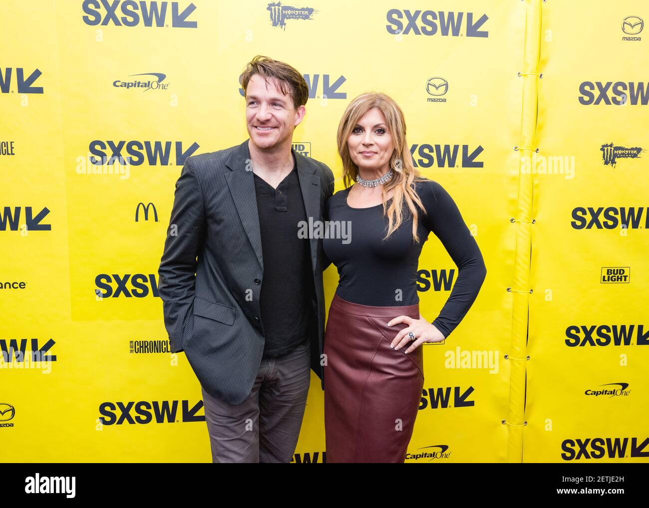 Brad Johnson and Parisa Caviani attend the premiere of Small Town Crime