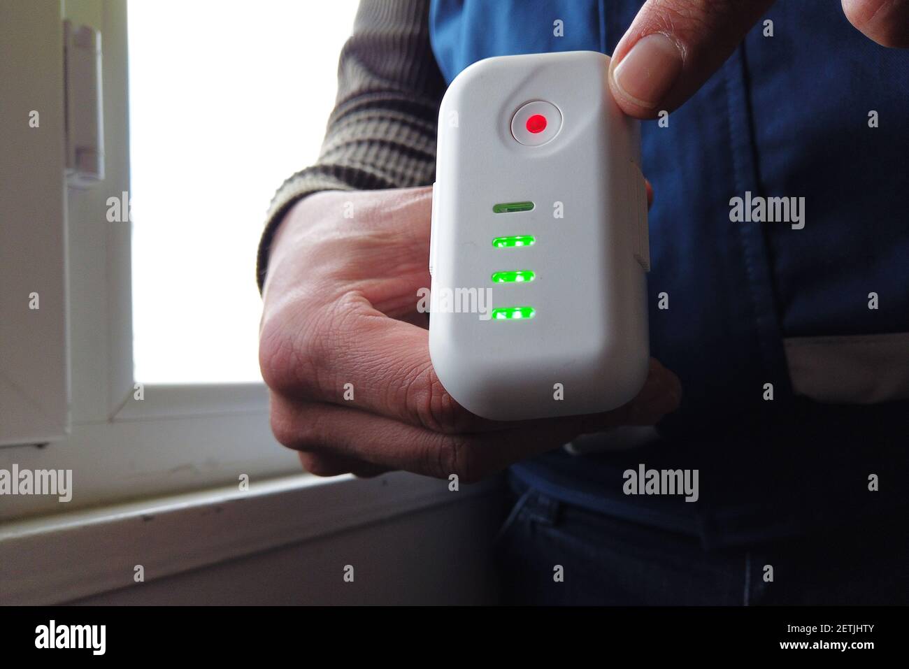 man checking drone battery charge Stock Photo