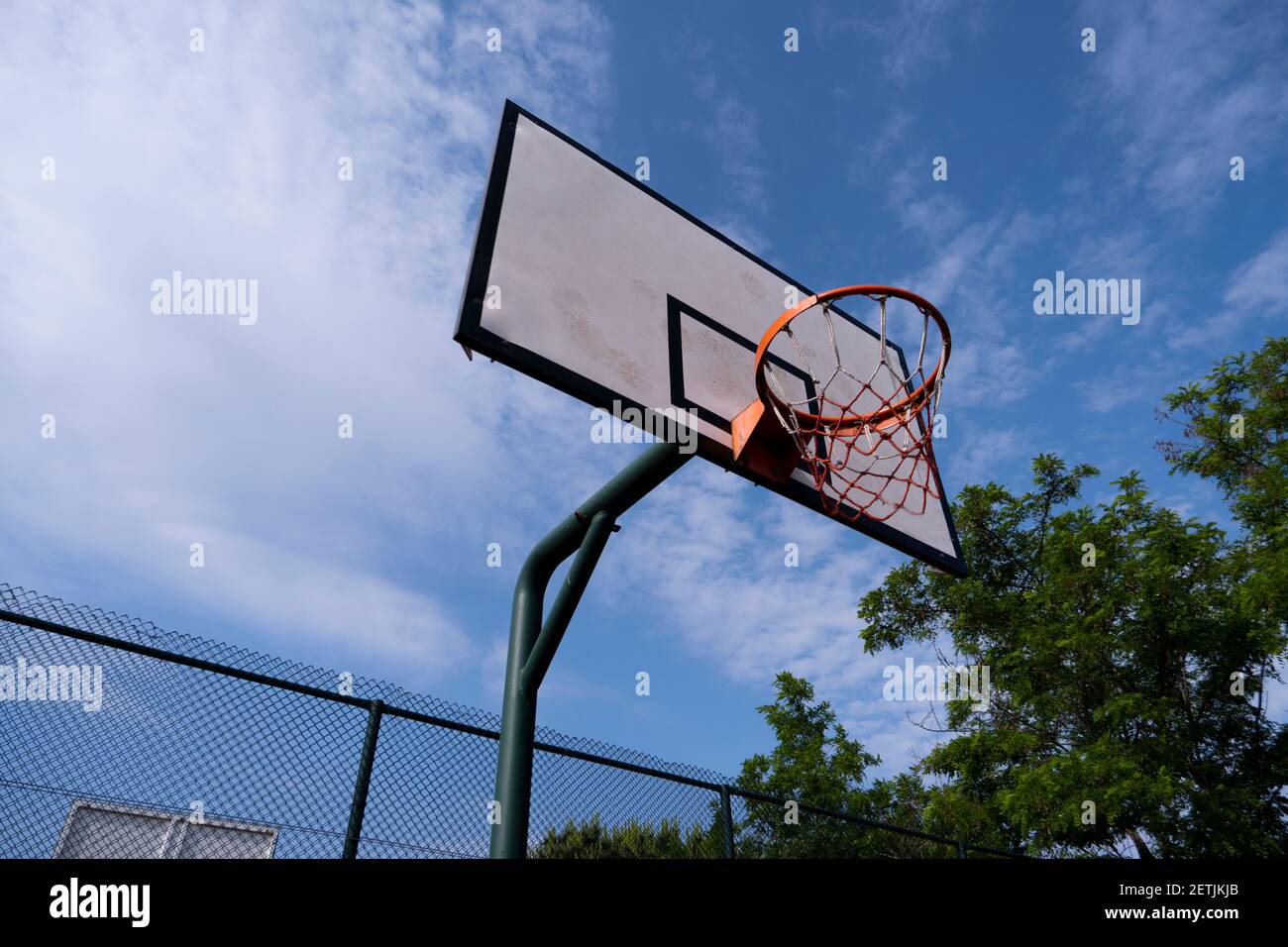 Basketball rim amazing shot with sky Stock Photo - Alamy