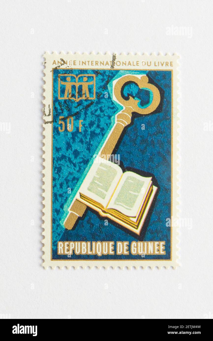 01.03.2021 Istanbul Turkey. Guinea Republic Postage Stamp. circa 1972. international year of the book. key of the knowledge Stock Photo