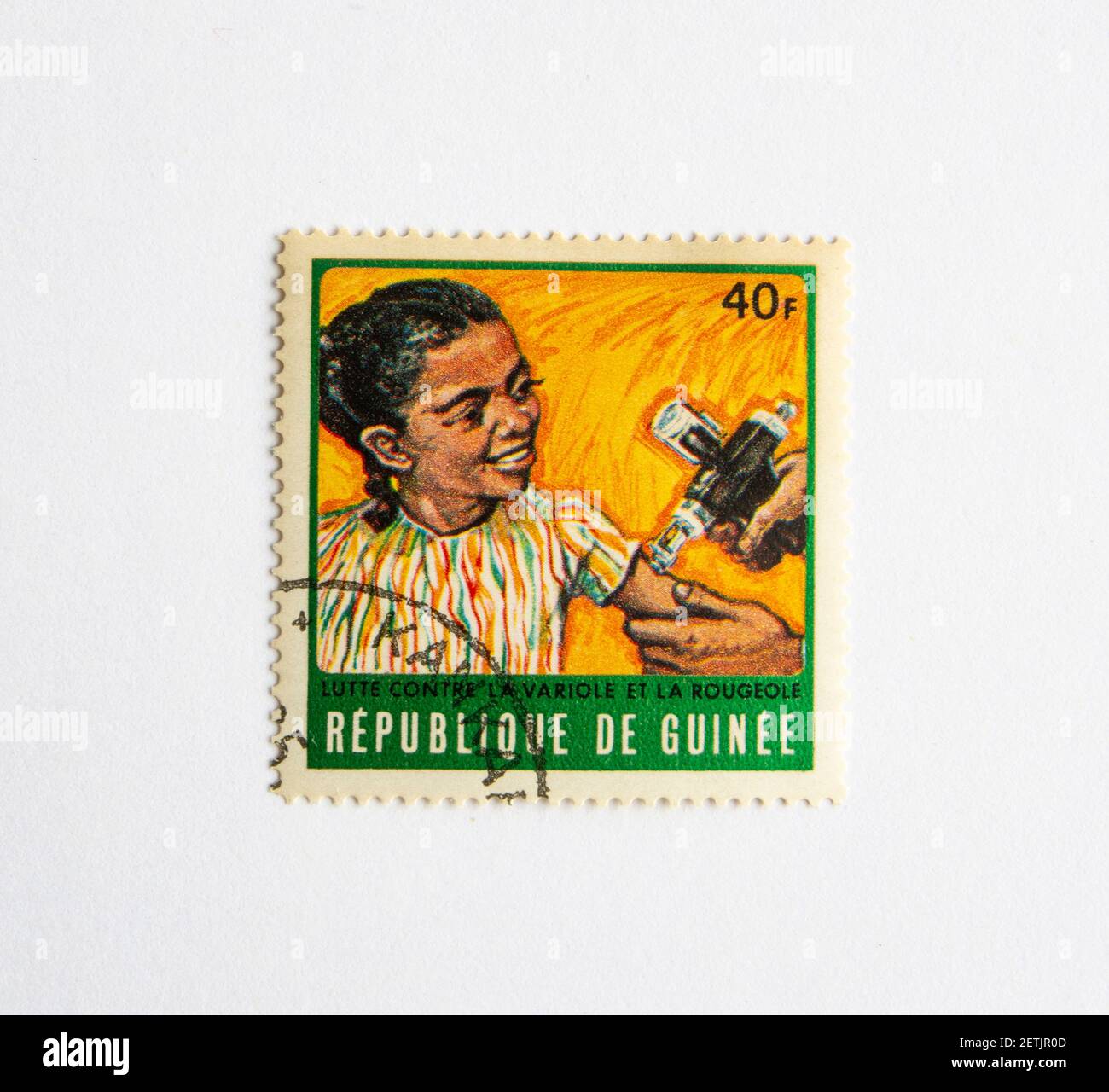 01.03.2021 Istanbul Turkey. Guinea Republic Postage Stamp. circa 1972. The fight for measles and smallpox control. vaccination girl Stock Photo