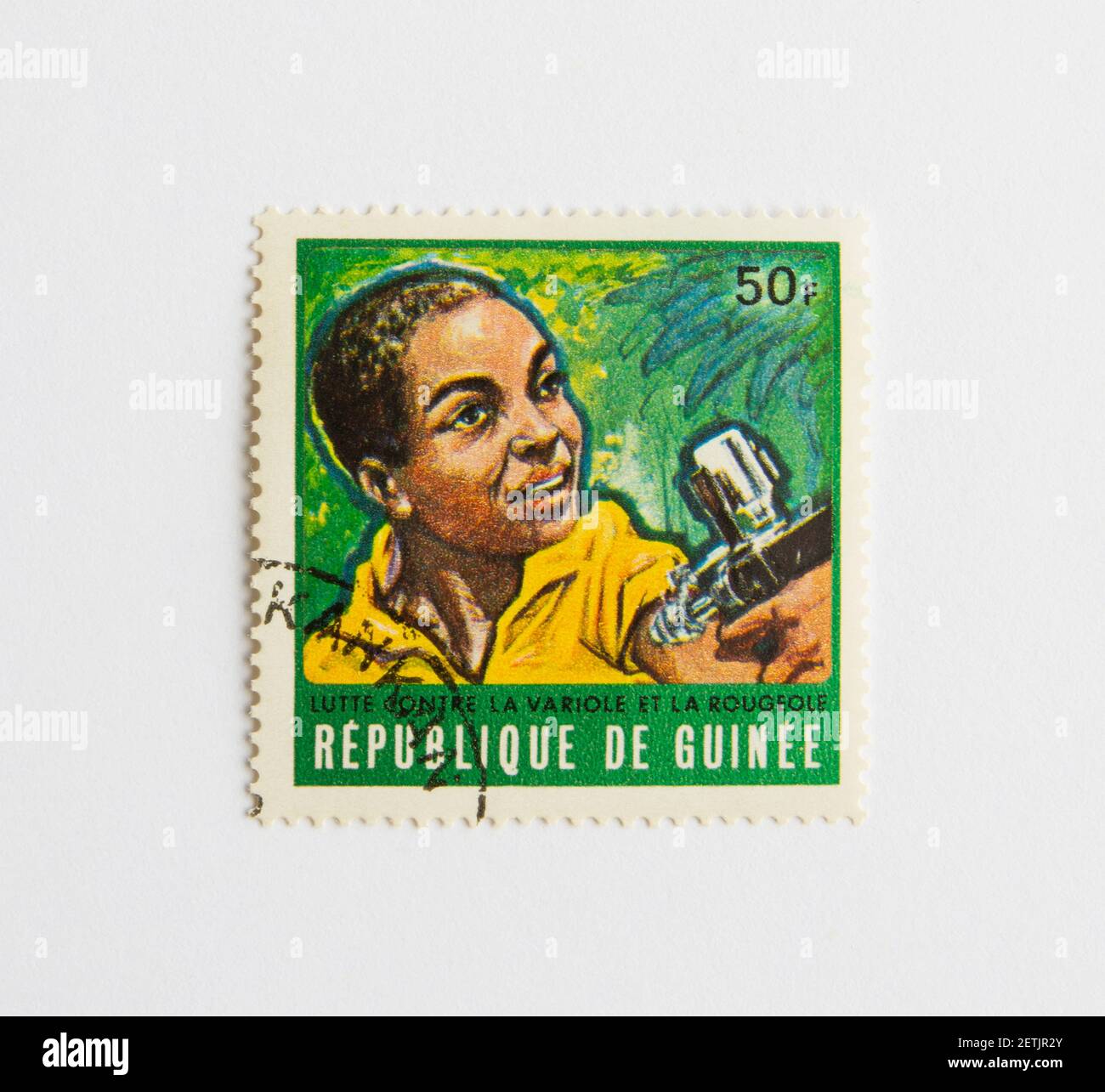 01.03.2021 Istanbul Turkey. Guinea Republic Postage Stamp. circa 1972. The fight for measles and smallpox control. vaccination boy Stock Photo