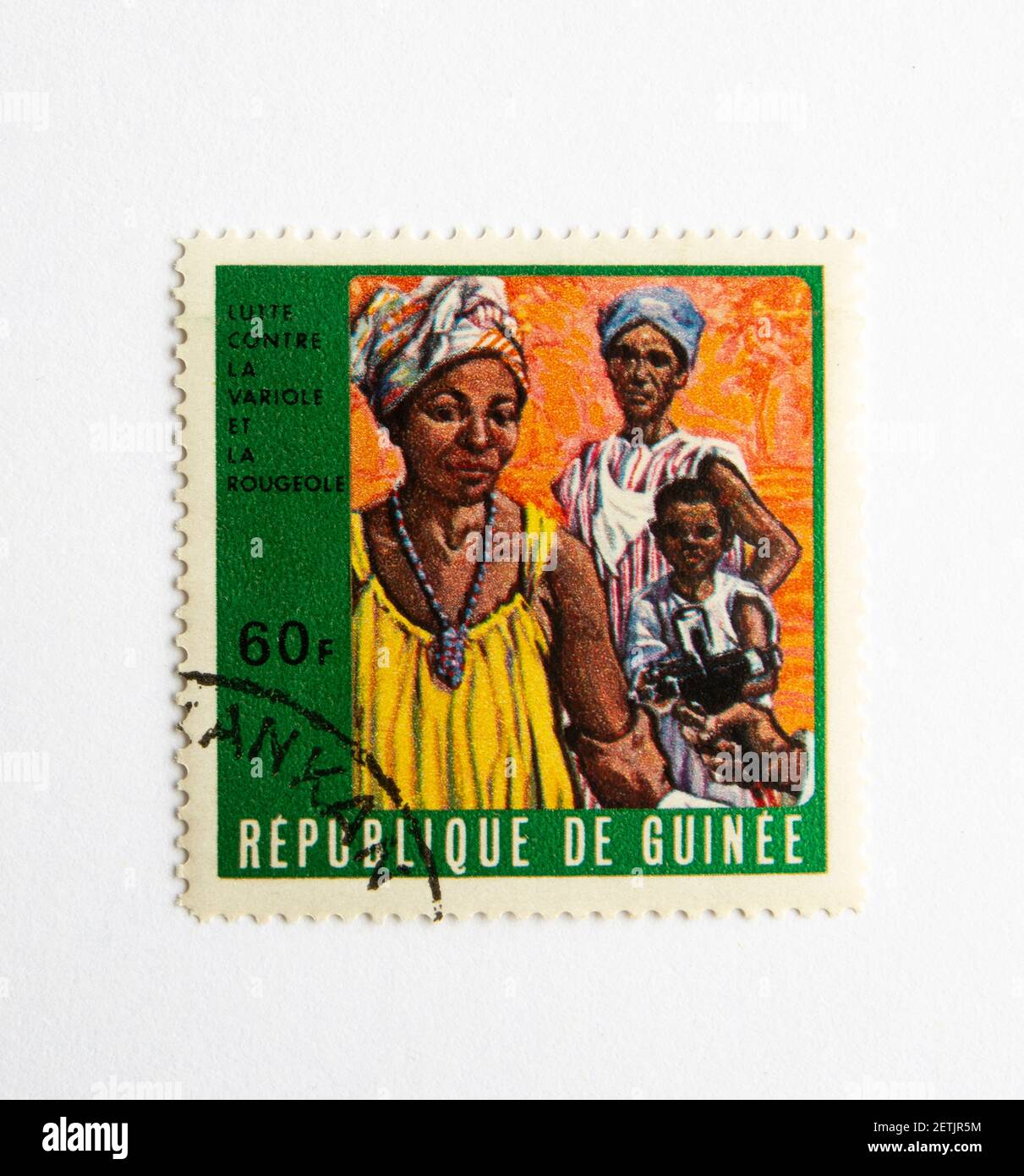 01.03.2021 Istanbul Turkey. Guinea Republic Postage Stamp. circa 1972. The fight for measles and smallpox control. vaccination woman Stock Photo