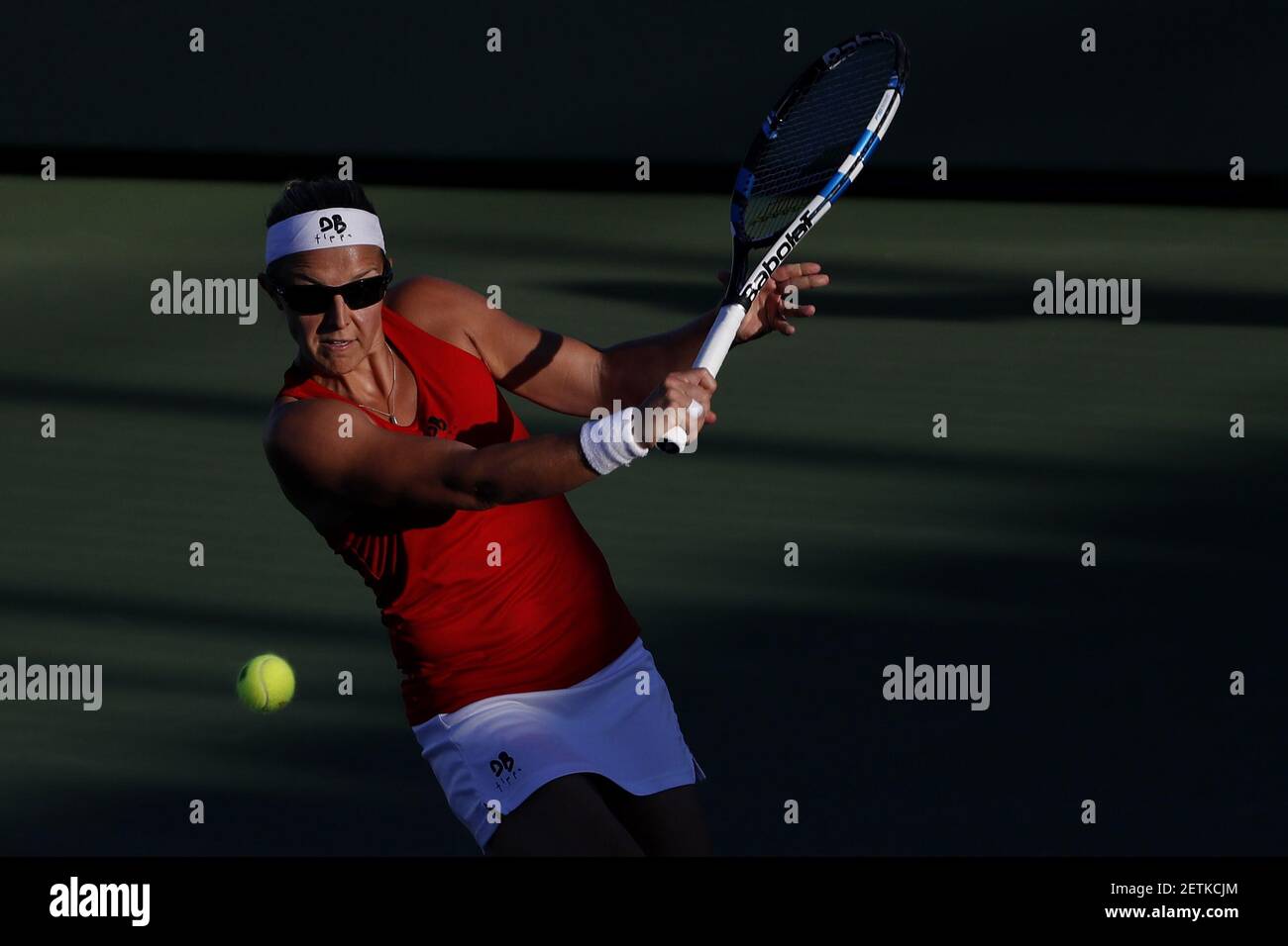 Mar 21, 2017; Miami, FL, USA; Kirsten Flipkens of Belgium hits a backhand  against Jennifer Brady of the United States (not pictured) on day one of  the 2017 Miami Open at Crandon