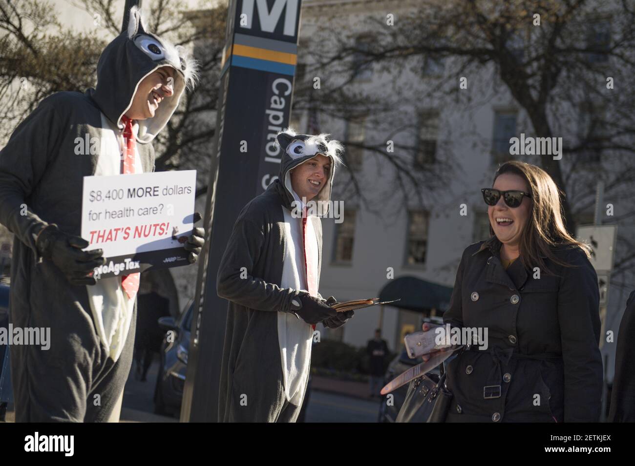 UNITED STATES - MARCH 23: Employees of AARP, who were dressed as squirrels, handout literature outside the Capitol South metro station opposing the 'age tax' in the Republican's American Health Care Act, March 23, 2017. The tax would increase premiums in people over age 50. (Photo By Tom Williams/CQ Roll Call) *** Please Use Credit from Credit Field *** Stock Photo