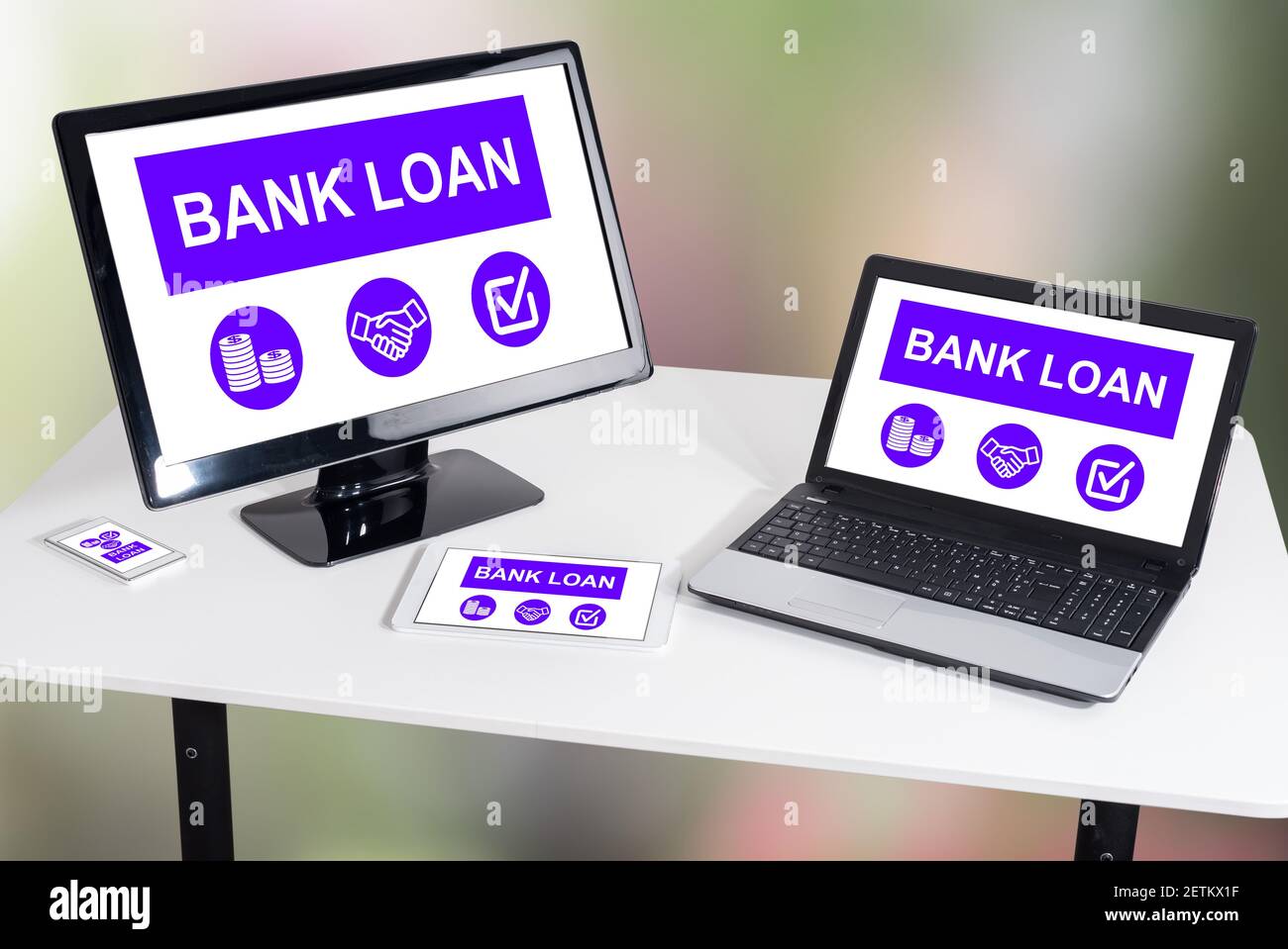 Bank loan concept shown on different information technology devices Stock Photo