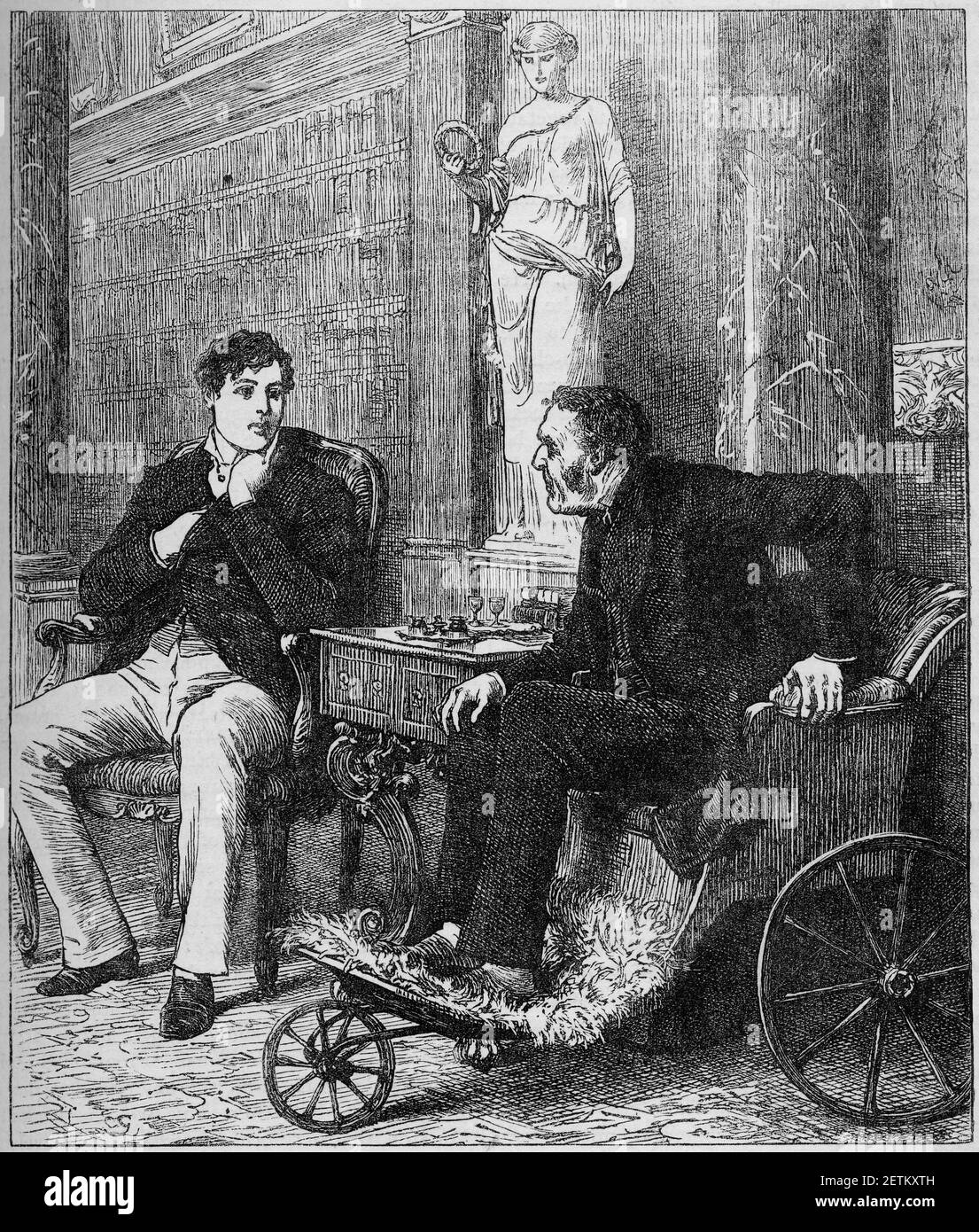 Engraving of a man in an old-fashioned wheelchair talking to a young man in the library of a stately house Stock Photo