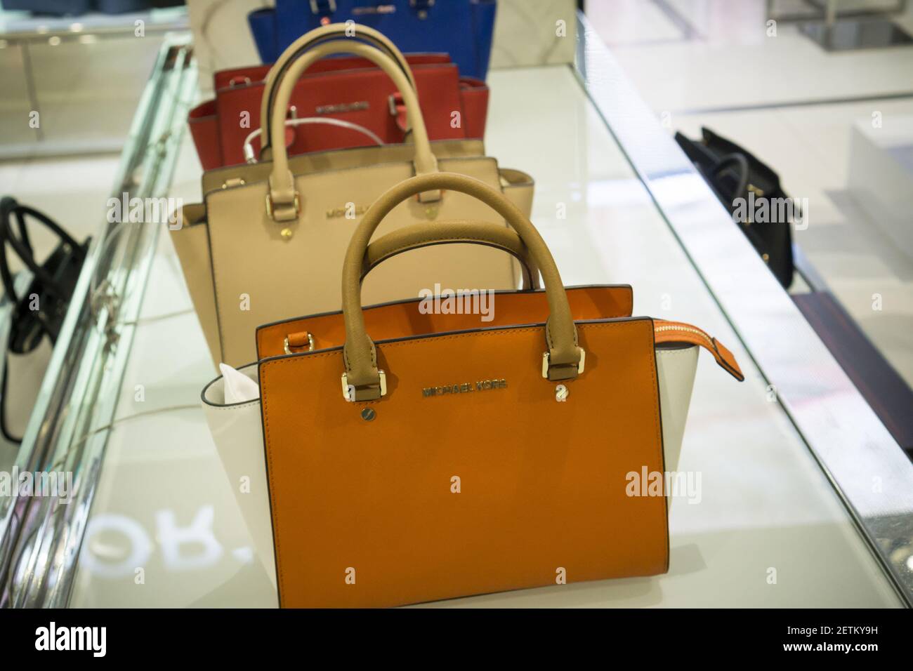 Michael Kors handbags in the Macy's Herald Square flagship store on Sunday,  March 26, 2017. (Photo by Richard B. Levine) *** Please Use Credit from  Credit Field *** Stock Photo - Alamy