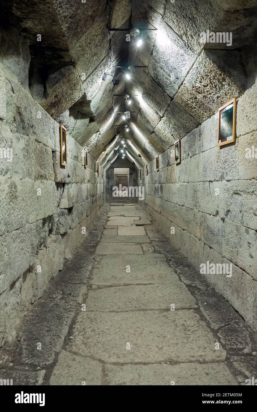 Stone corridor in prehistoric Thracian burial chamber Stock Photo