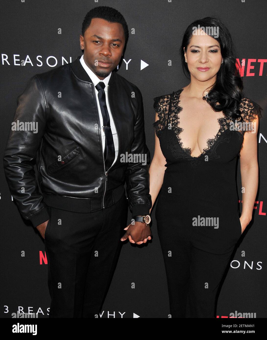 (L-R) Derek Luke and Sophia Adella Hernandez at Netflix's "13 Reasons