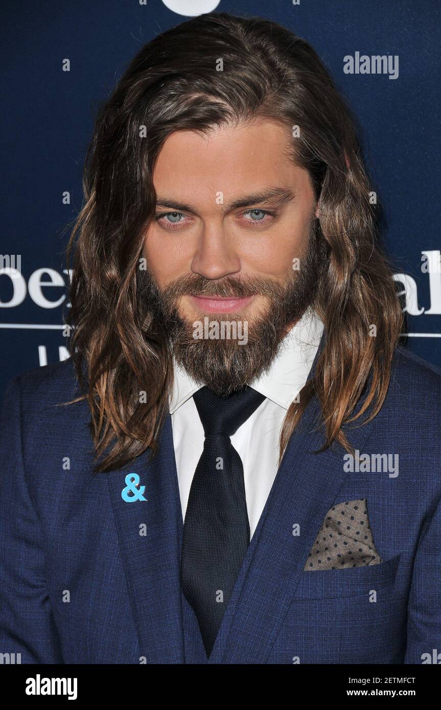Tom Payne arrives at the 28th Annual GLAAD Media Awards held at the ...