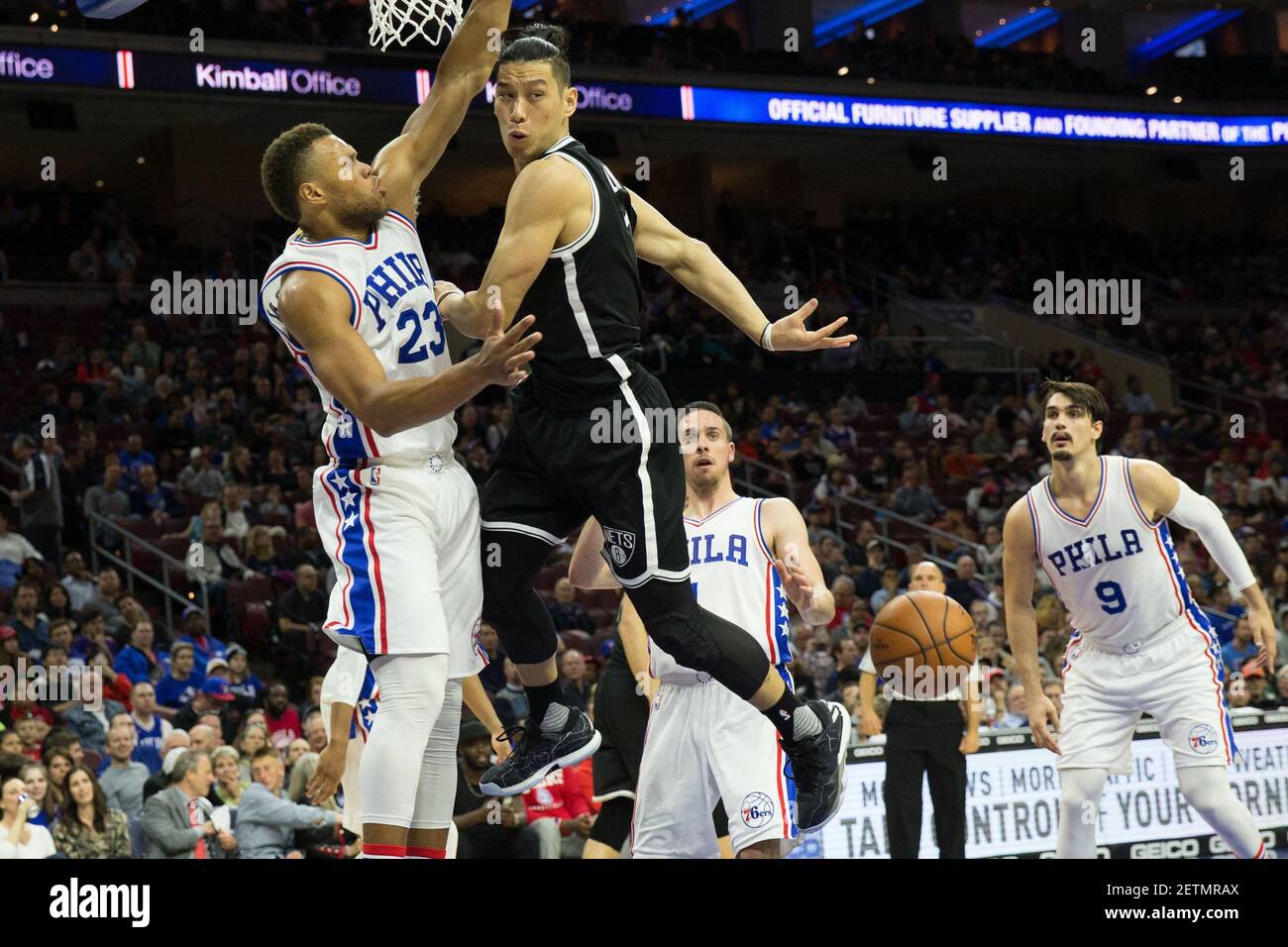 Apr 4, 2017; Philadelphia, PA, USA; Brooklyn Nets guard Jeremy Lin (7) passes behind his back past Philadelphia 76ers guard Justin Anderson (23) during the second quarter at Wells Fargo Center. Mandatory Credit: Bill Streicher-USA TODAY Sports *** Please Use Credit from Credit Field *** Stock Photo