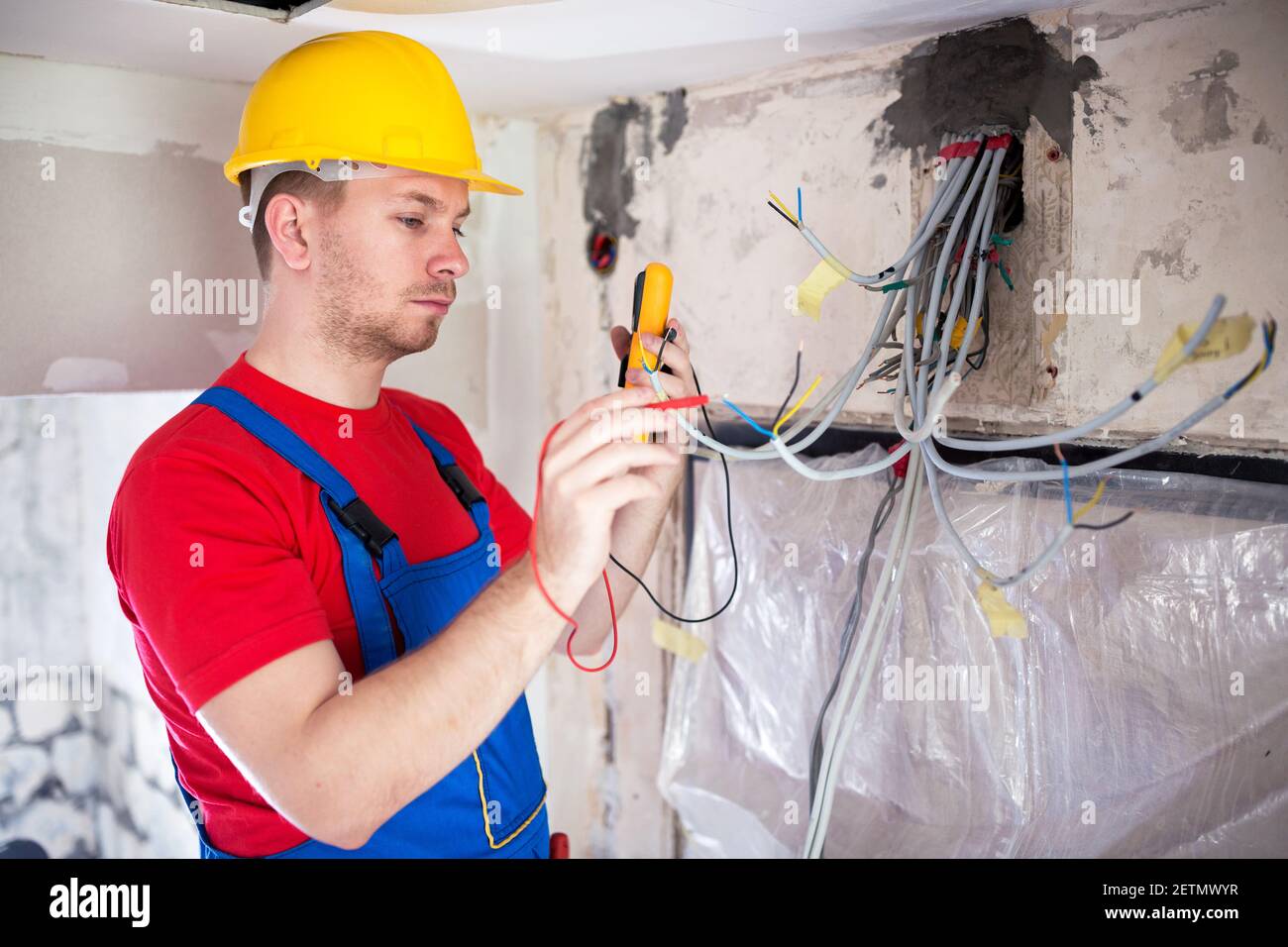 Checking of current distribution system using unimer electrical instrument Stock Photo