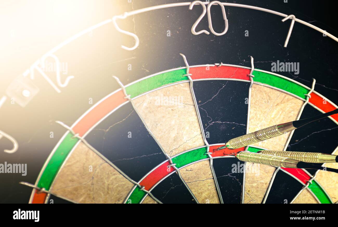 Dart board with winning darts. Highest score on dartboard. Success and business concept. Stock Photo