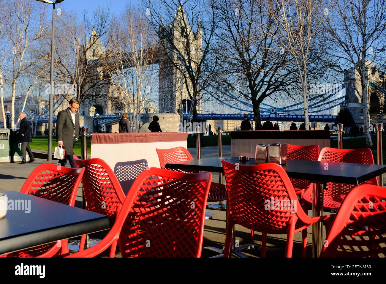 LONDON - 21ST JANUARY 2020: A view from Caffè Kimbo on Potters Field Park, looking towards Tower Bridge on a  clear sunny day in London. Stock Photo